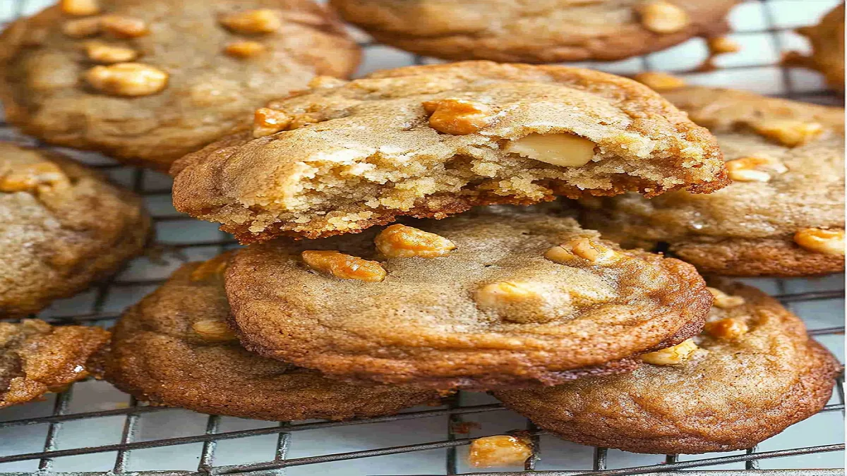 Soft, chewy banana bread cookies with chocolate chips on a plat